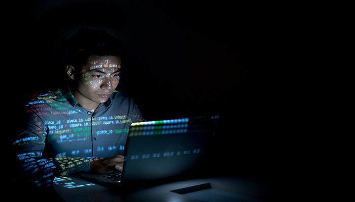 Programmers Hands Are Coding On A Laptop In The Dark With A View