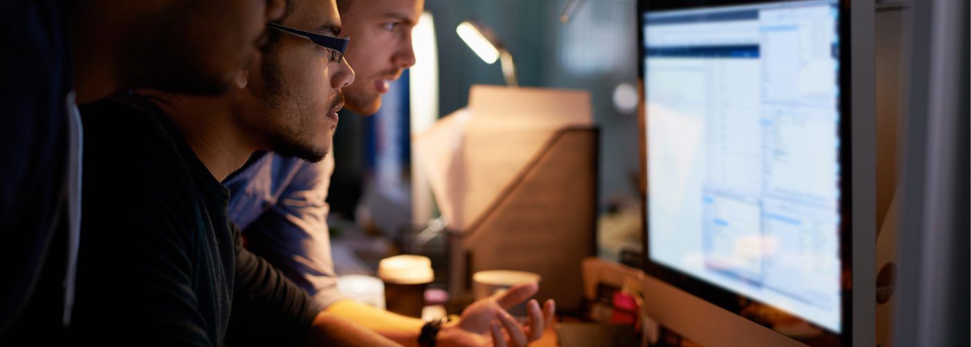3Guys Looking at a monitor