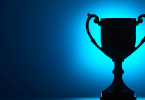 trophy-silhouette-blue-background
